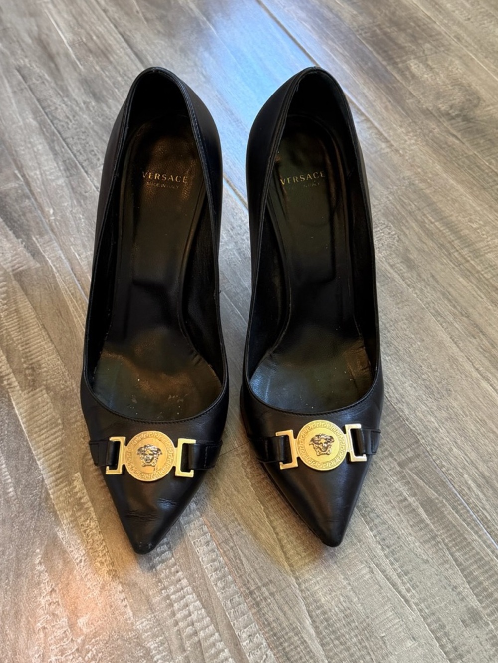 Versace Black Pointed-Toe Leather Pumps with Gold Medallion Hardware